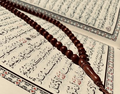 can a woman recite the quran on her period?