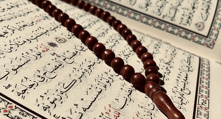 can a woman recite the quran on her period?