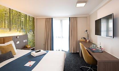 <a href="#retreats-2025-single-double-room">Double (2 adults) - double bed</a>